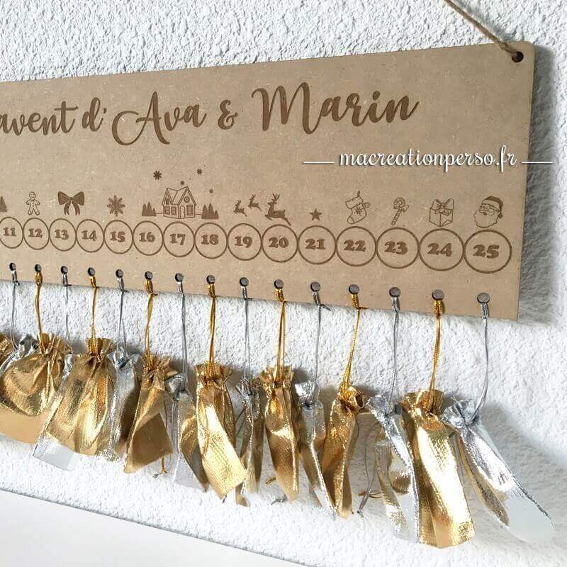 Calendrier de l'avent personnalisé en bois avec petit sachet de couleur  or et argent