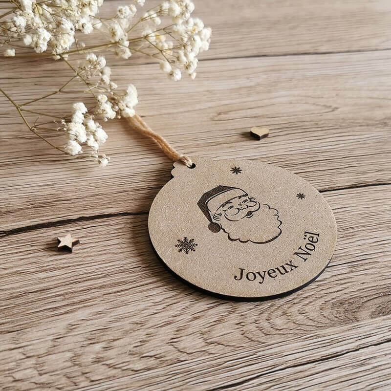 Boule de noël personnalisée avec tête de papa noël et flocons