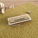 Insigne en bois de pharmacie marqué Caroline sur plaque dorée