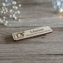 Badge en bois avec logo vue de haut