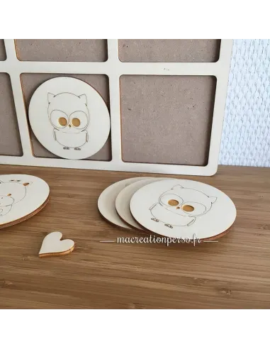Pièces rondes en bois sur les animaux pour le jeu de mémoire en bois