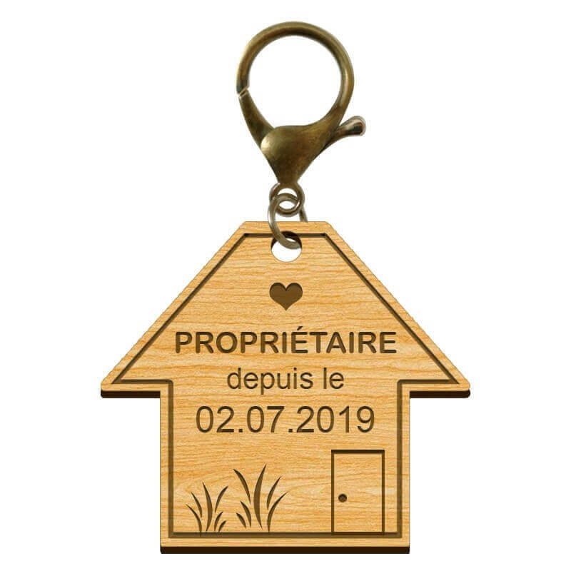 Porte-clé gravé Propriétaire depuis le deux juillet deux mille dix neuf avec un mousqueton vieil or