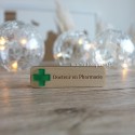 Badge Docteur en Pharmacie avec croix verte transparente