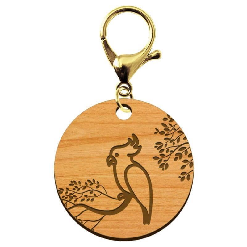 Porte clés artisanal perroquet personnalisé en bois mousqueton or