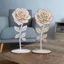 2 roses éternelles avec Prénoms sur les feuilles et phrase sur le socle