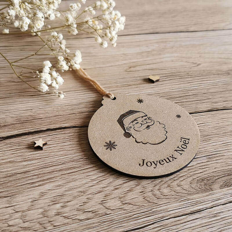 Boule de noël personnalisée avec tête de papa noël et flocons