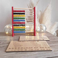 Boulier en bois avec deux versions de tableau d'apprentissage montessori