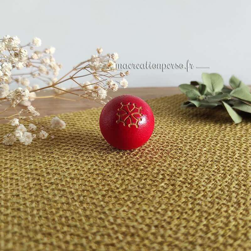 Cochonnet pétanque rouge personnalisé avec une croix occitane
