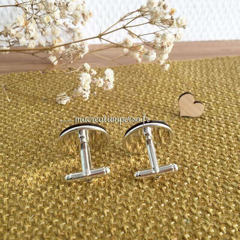 Fixations des boutons de manchette argentées