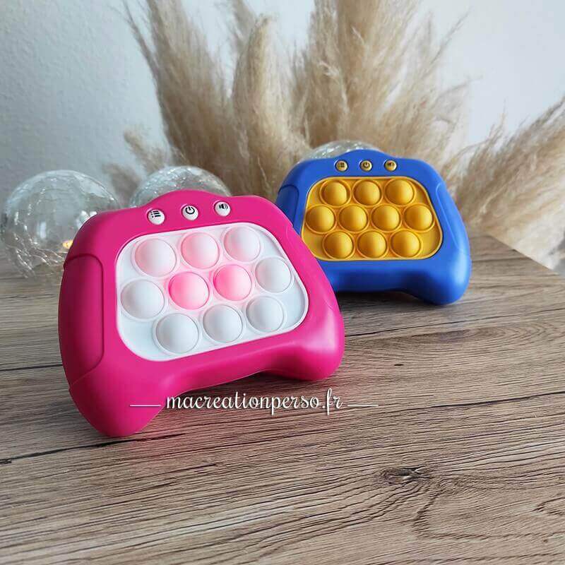 Jeu pop it manette électronique rose ou bleu au choix