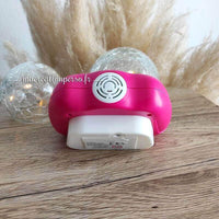Pop it jeu anti stress électronique manette rose et blanche