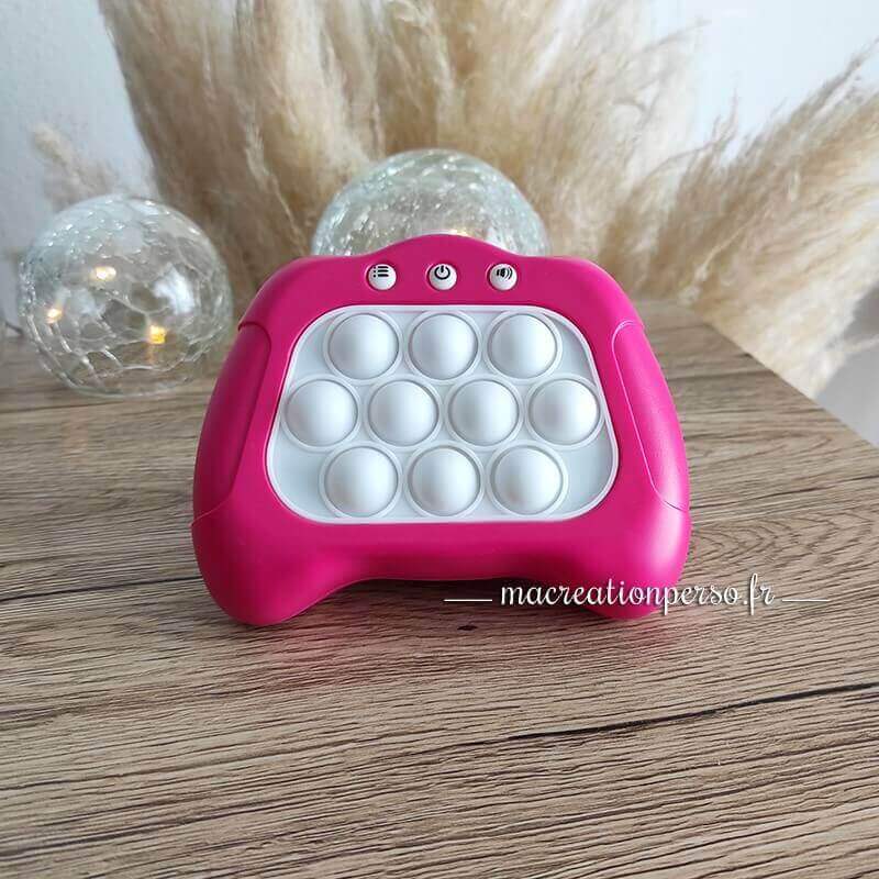 Pop it toy manette électronique rose et blanche