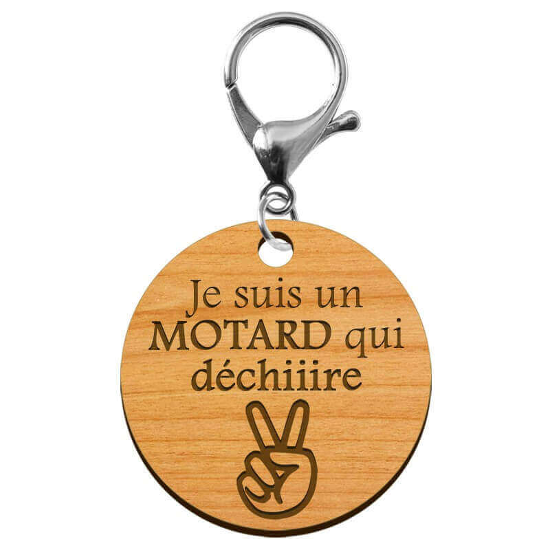Porte-clé motard "Je suis un motard qui déchiiire" à personnaliser avec un mousqueton argenté