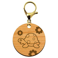 Porte-clé personnalisable en bois tortue de taille 45 mm mousqueton doré