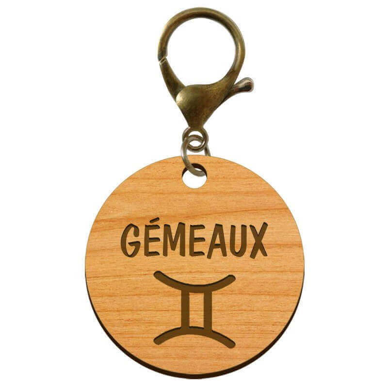 Signe astrologique gémeaux gravé sur porte clé bois mousqueton bronze