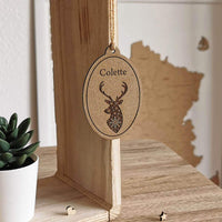 Suspenstion murale thème cerf de noël en bois gravée